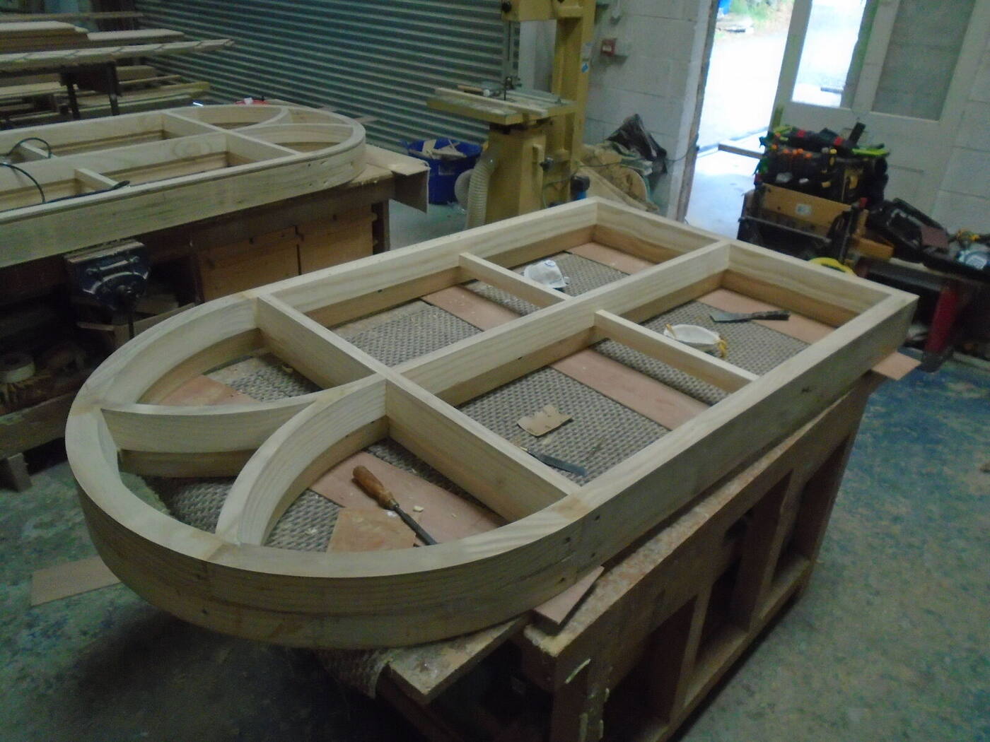 Arched chapel window frame in the Thomas Joinery workshop