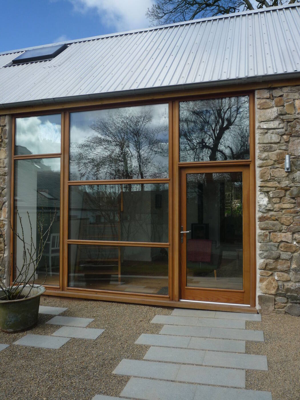Stairs, kitchen and screen at Ty Lloi
